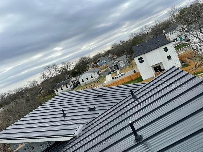 Standing seam metal roof panels with vents for Skylight Repair in Ashtabula